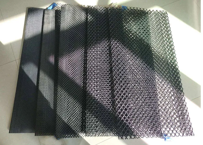 Black extruded oyster mesh sheet shown close up